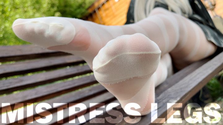 My cute feet on the bench in the white pantyhose