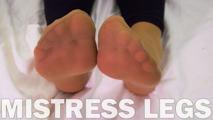 Mistress feet in soft nylon socks