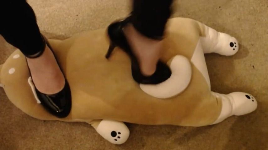 Trampling soft toy in stilettos