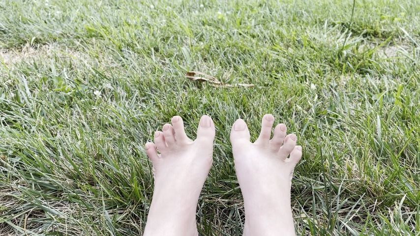 Close Up Footplay Barefoot in the Grass