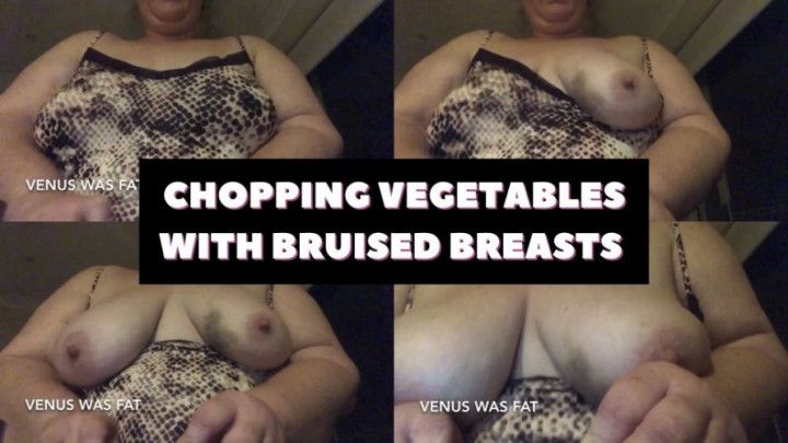 Chopping vegetables with bruised breasts