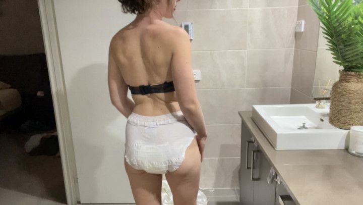 Diaper pissing and playing
