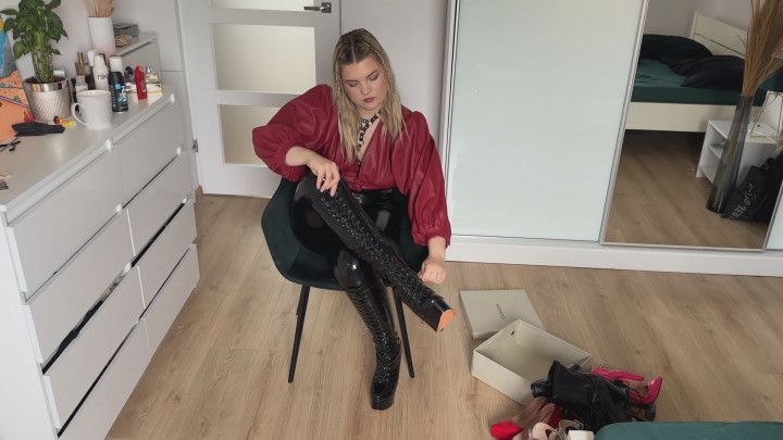 Woman in leather clothes show her boots and heels collection