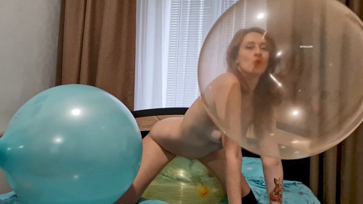 Popping large 36 and 24 inch balloons