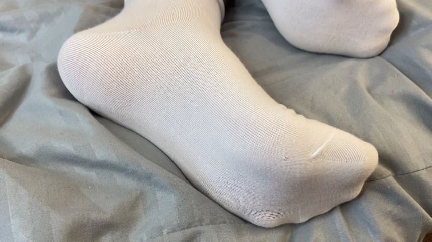 Rubbing your dick with my feet in socks