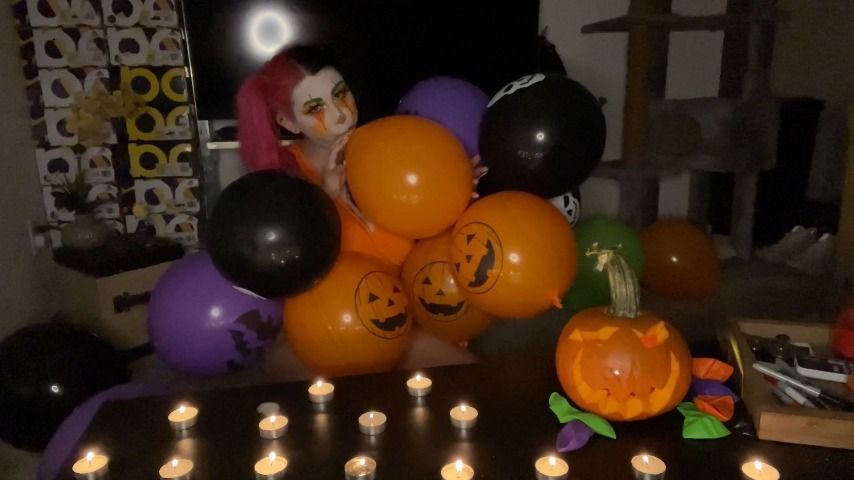 Halloween Clown Blowing Balloons