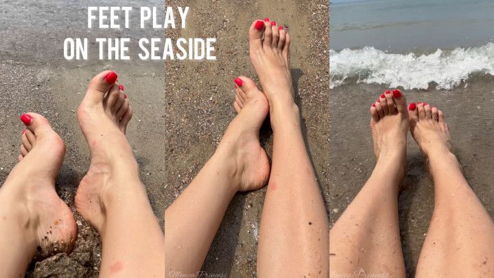 Feet play on the seaside