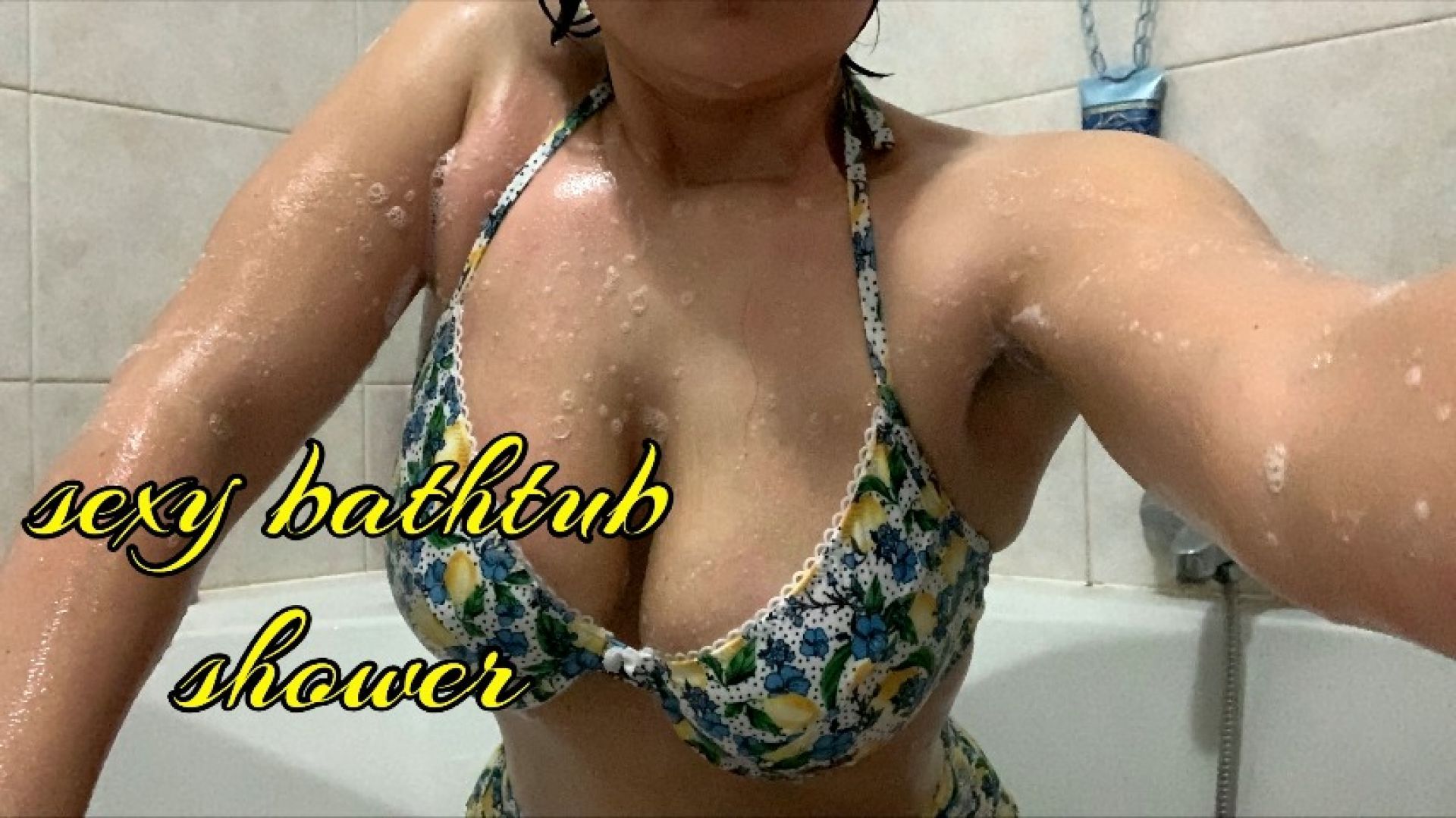 sexy shower in the bathtub with bikini suit