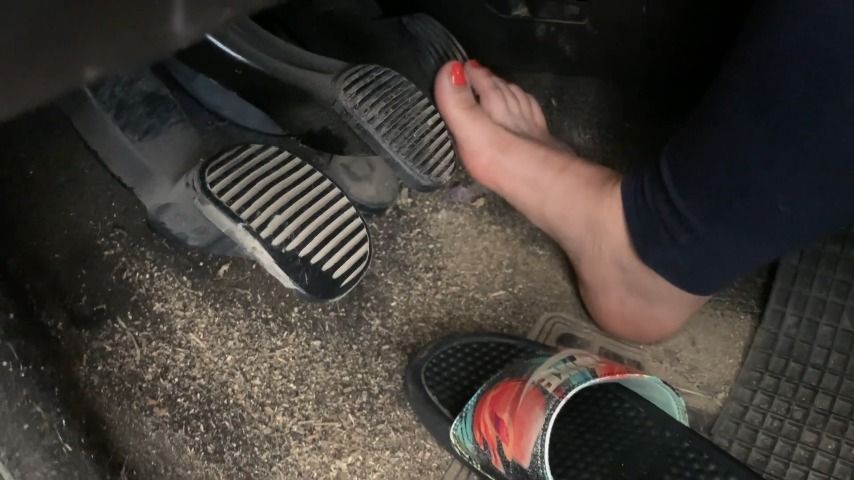 pedal pumping barefoot with orange nails