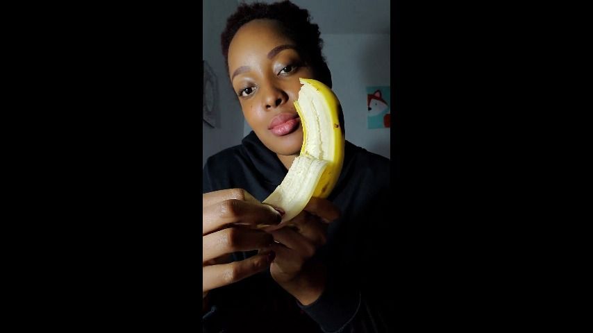 Sucking a banana