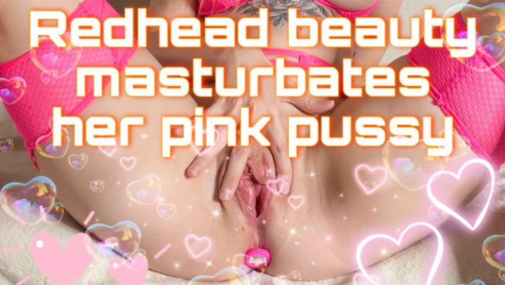 Redhead beauty masturbates her pink pussy