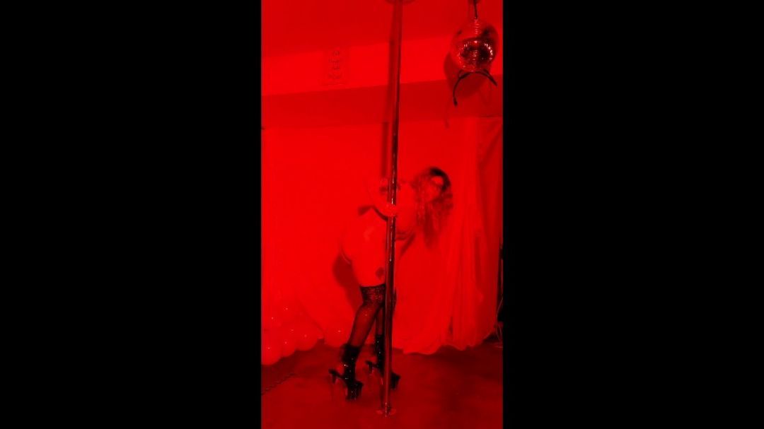 Pole Dancing in the red light