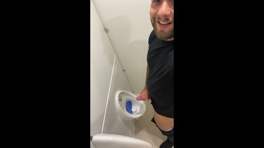 Wanking and cumming in public urinal