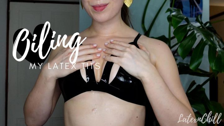 Oiling my latex tits