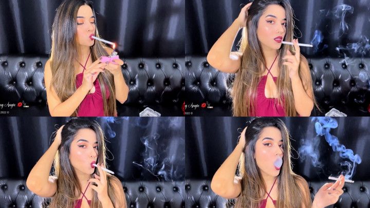 Angie seductively smokes a 120s cigarett