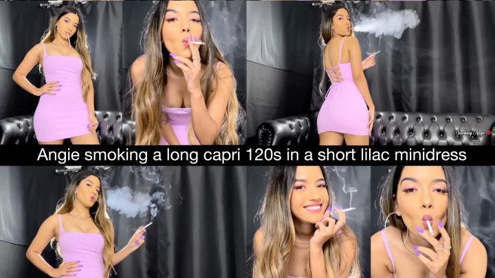 Angie smoking a long capri 120s in a short lilac minidress