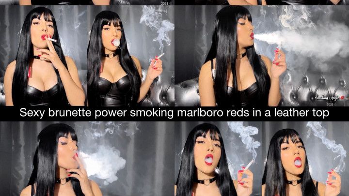 Sexy brunette powersmoking Marlboro Reds in a leather top