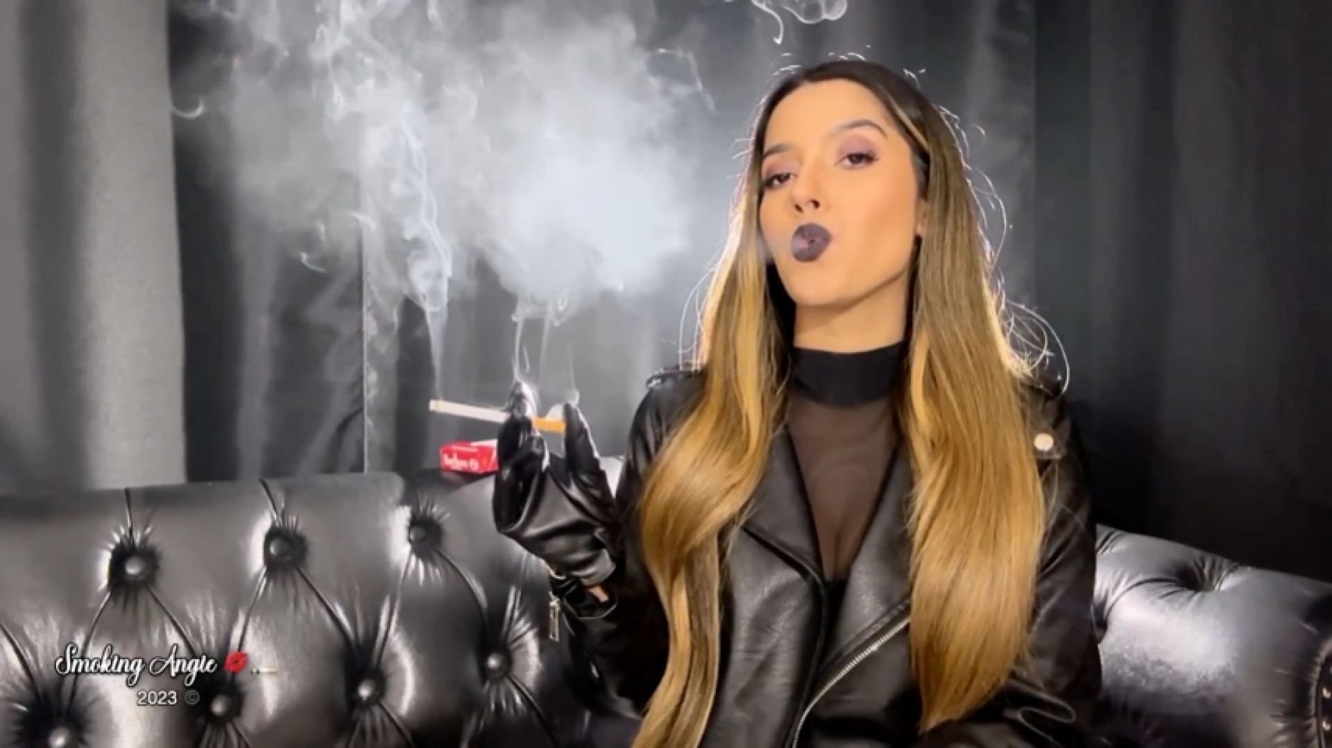 Black lips, leather gloves, leather jacket, marlboro red 100