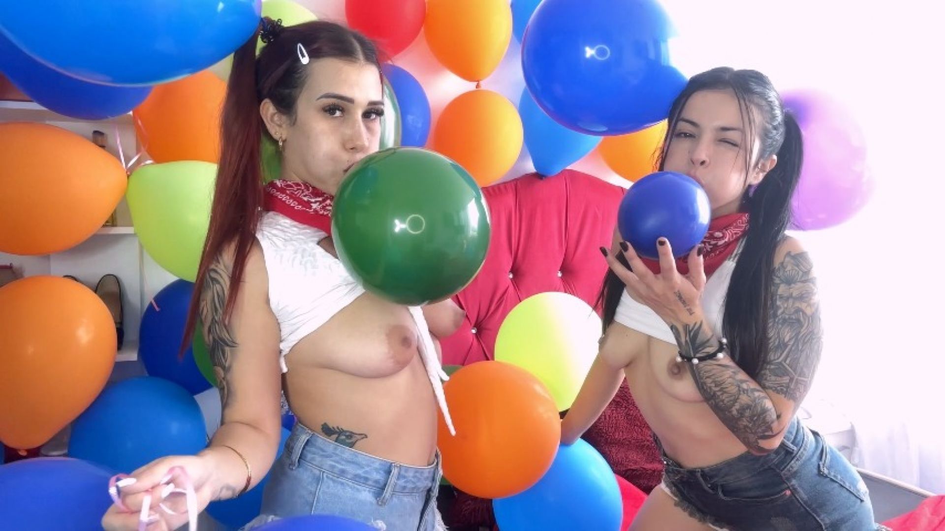 Showing our tits while blowing up balloons