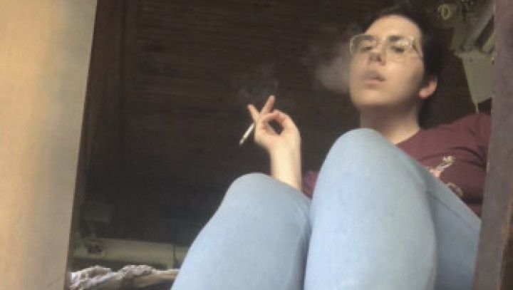 Smoking in white Nikes and filthy socks