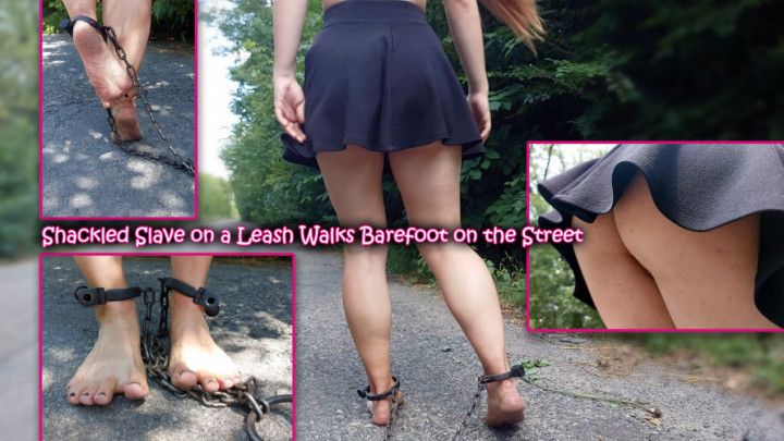 Shackled Slave on a Leash Walks Barefoot on the Street