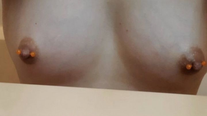 Small pierced tits with dark thick nips