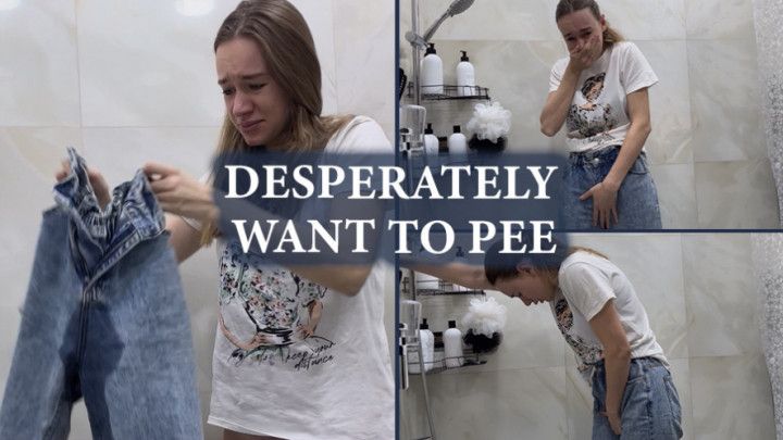 Desperately pissing in jeans