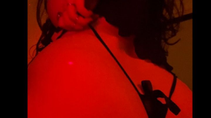 CUMMING UNDER RED LIGHT