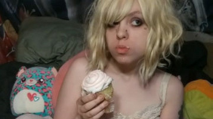 Cutie eating a cupcake