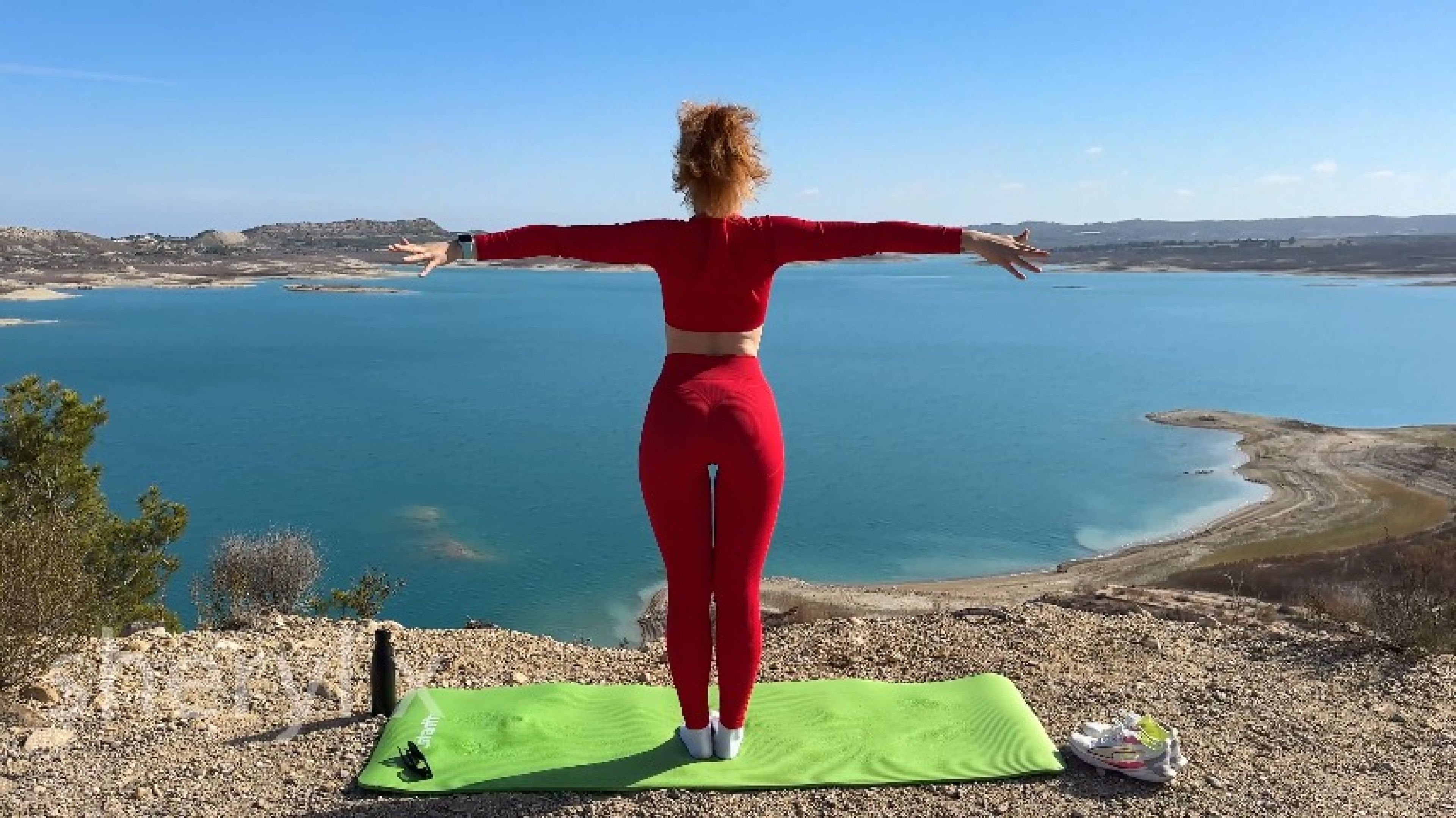 Deep Stretching In Red Sport Suit