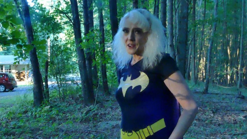 Batgirl pees in the woods