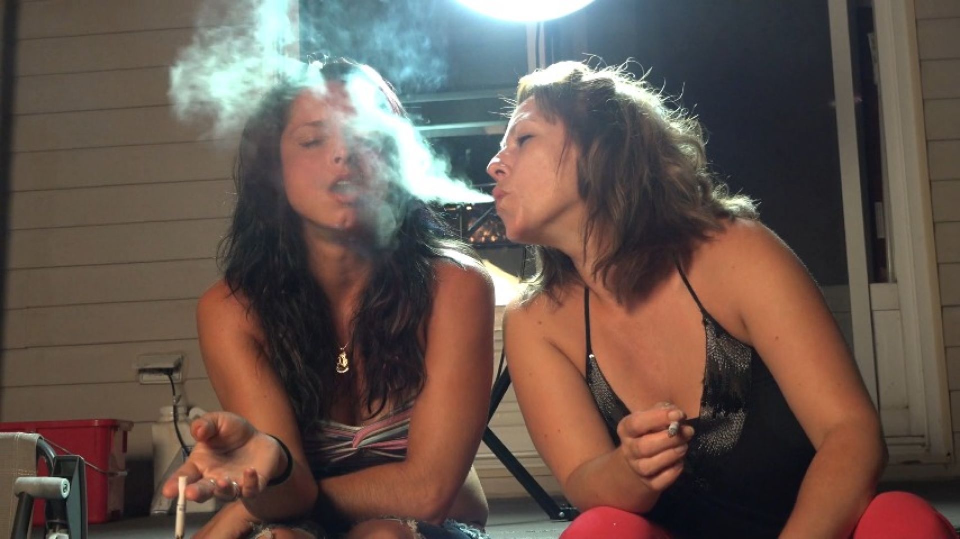 Ticha and Sun-shine, loving smoke play with each other