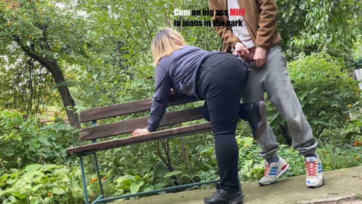 Cum on big ass MILF in jeans in the park