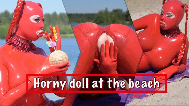 Horny doll at the beach