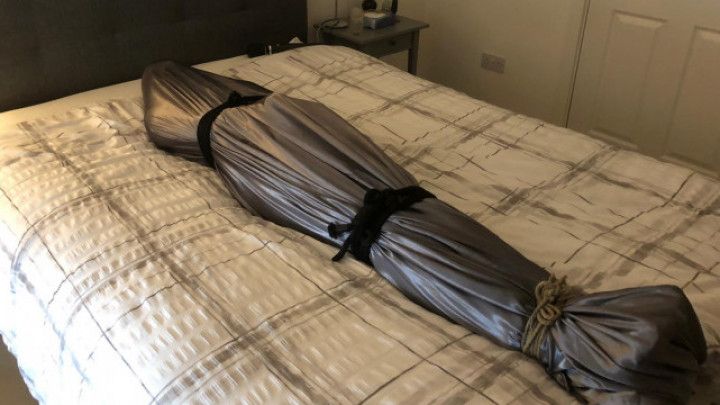 Mummified twink in satin