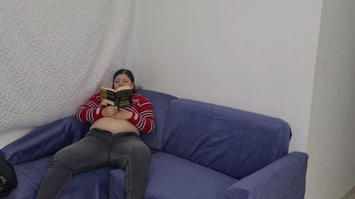 Reading a book, belly fetish