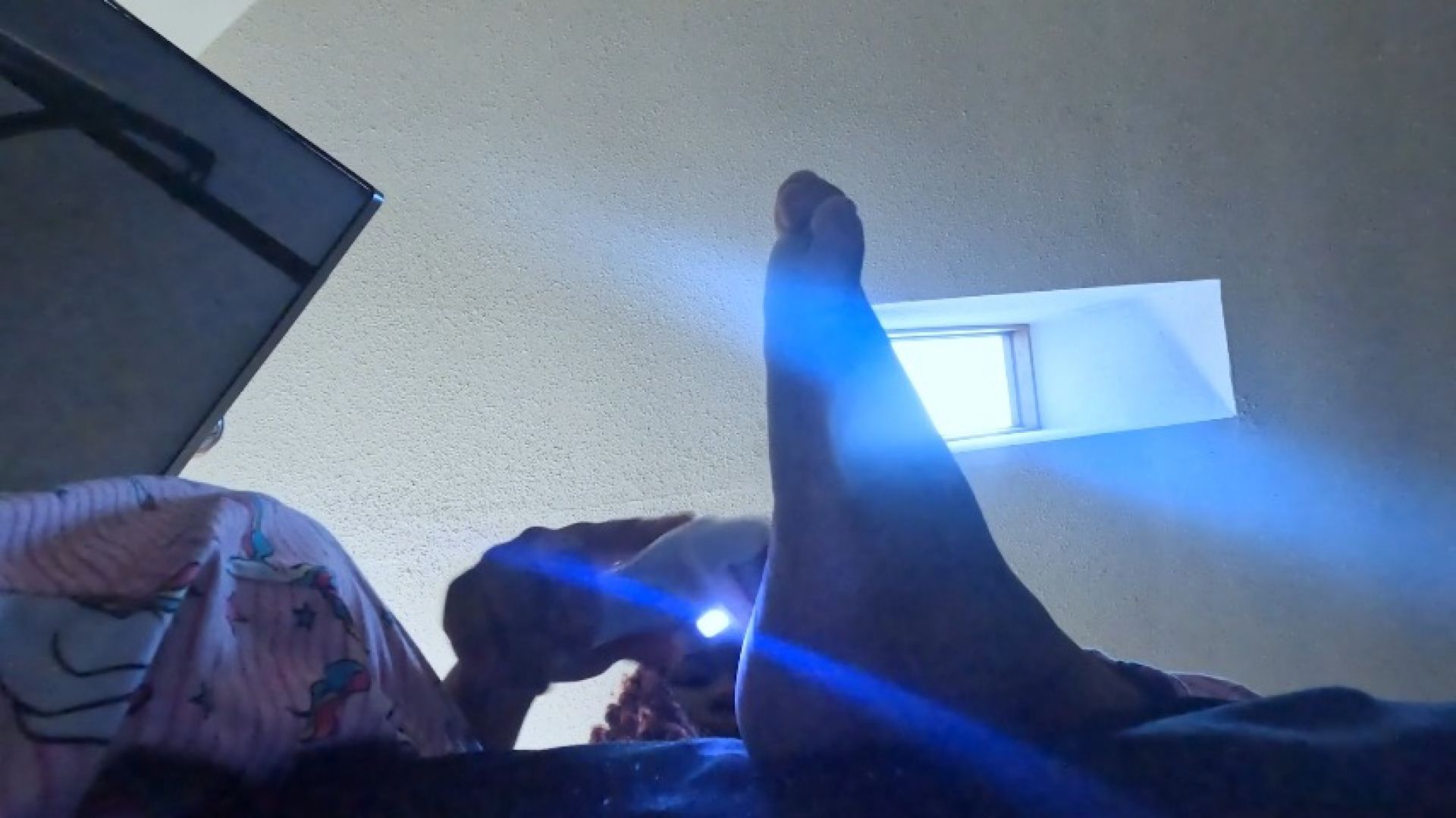 Slave lays on floor at Goddess feet POV