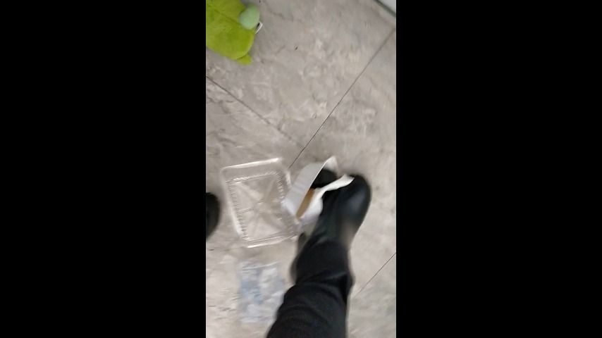 Trampling on trash in boots