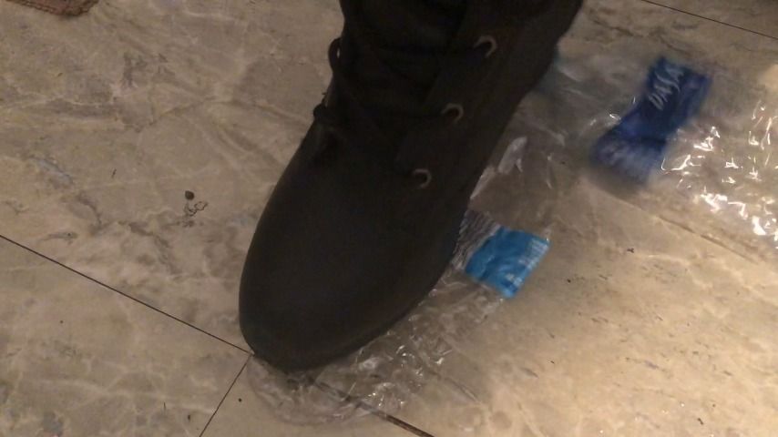 stomping on bottles in cute boots