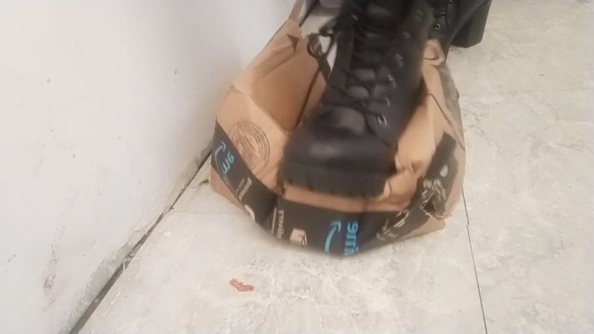 stomping on box in sexy shoes