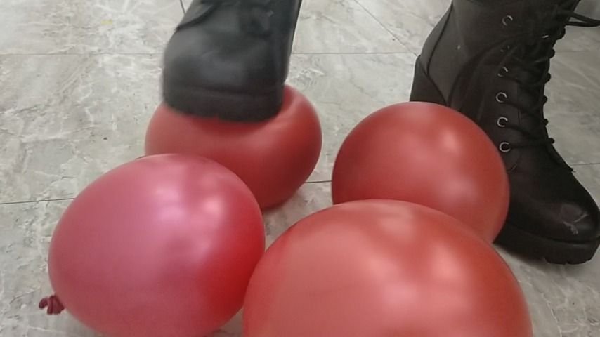 stomping on red Balloons in black boots