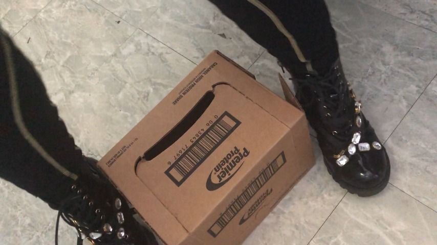 stomping on box and bottles in boots