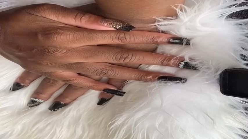 Sexy nails against white fur