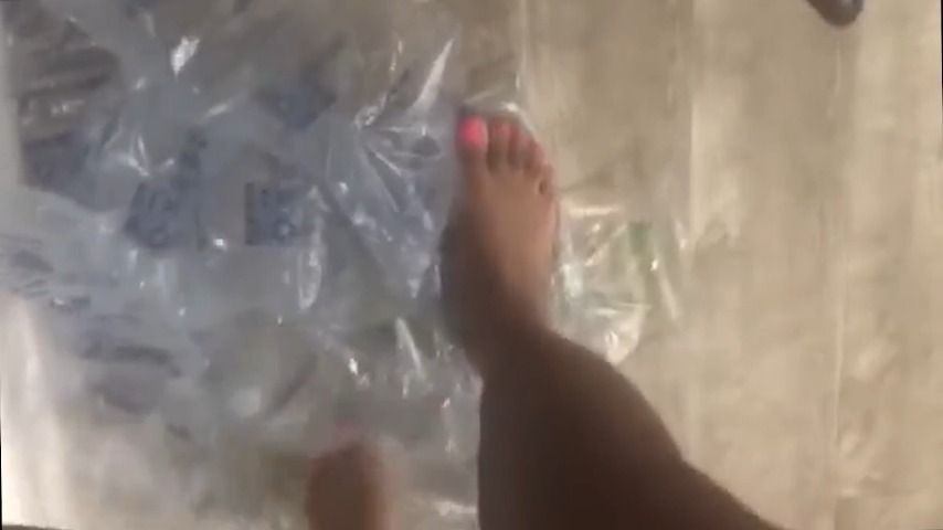 pov of plastic wrap stomping