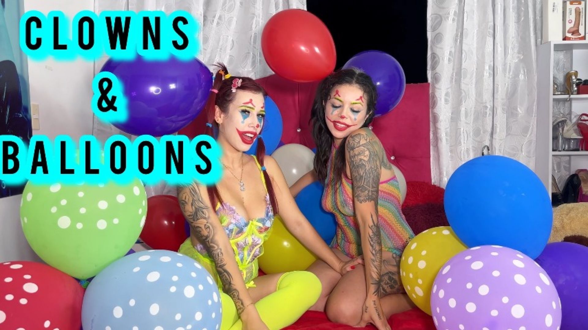 Two hot clowns playing with balloons