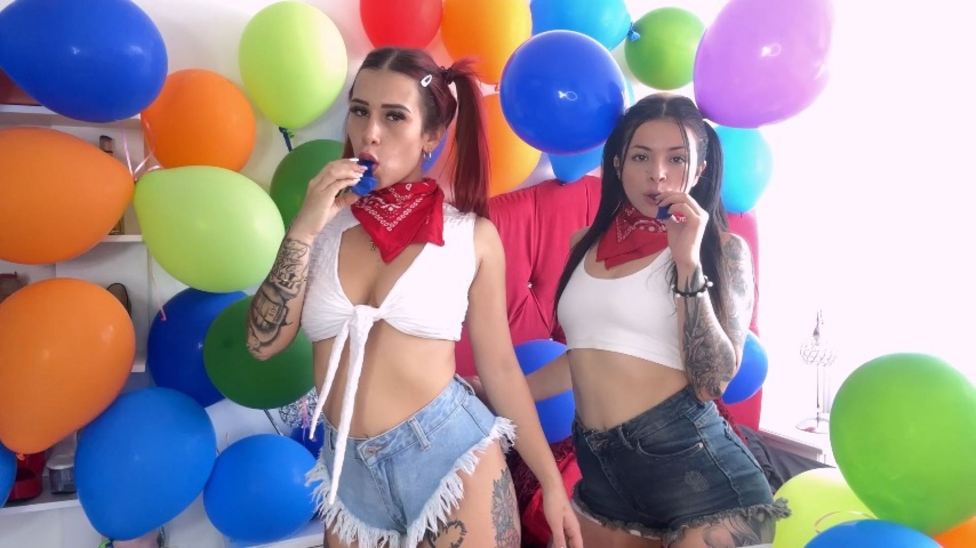 Rubbin our nipples against the balloons