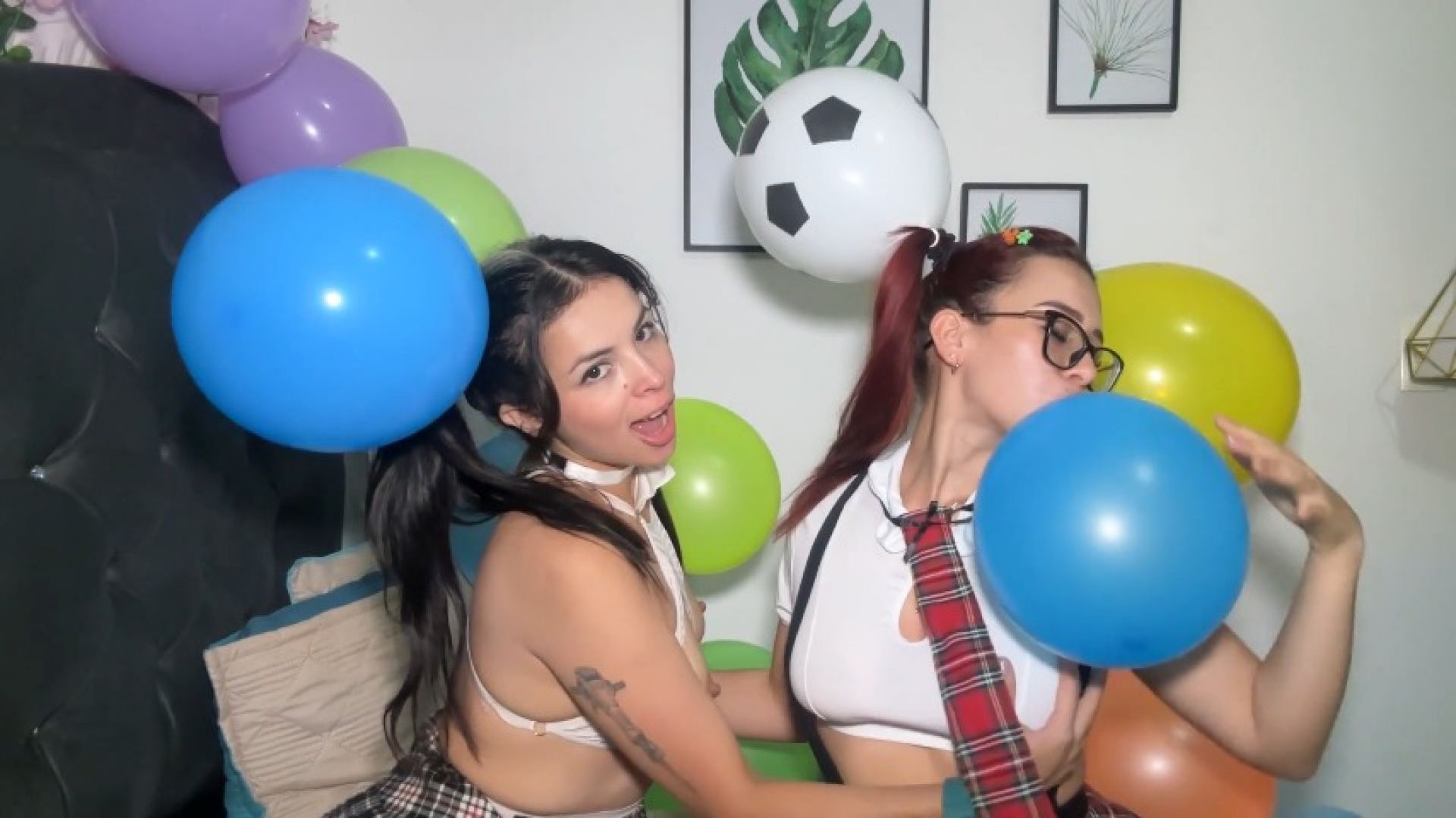 Horny girls blowing up balloons after soccer