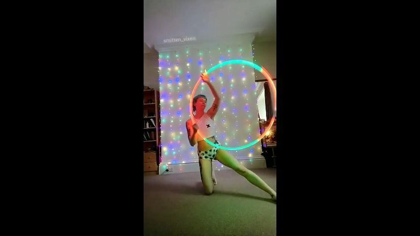 Hula hooping in cute booty shorts