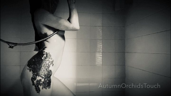 Tattooed sexy woman orgasms in shower