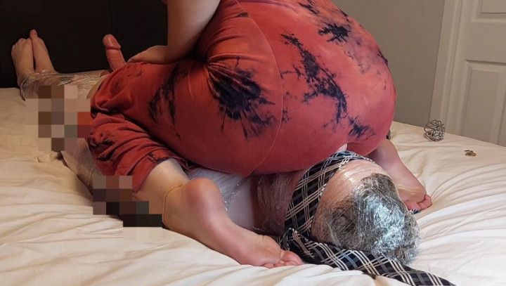 Mummified face sitting and farting in chastity